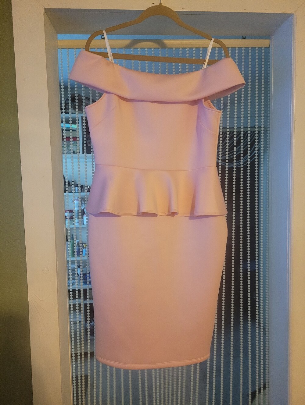 BEBE Off-Shoulder Peplum Bodycon Dress in Light Pink